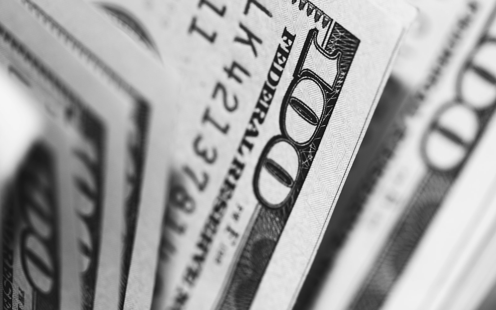 Close-up of a stack of one hundred dollar banknotes